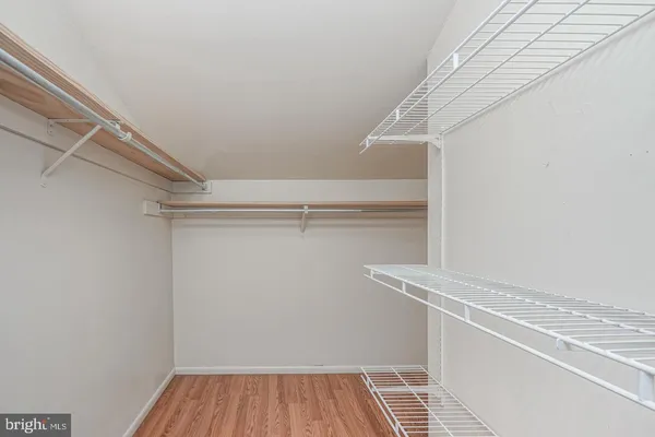 a view of a room with racks on the wall