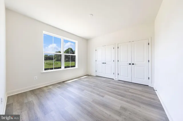 a front view of a house with a outdoor space