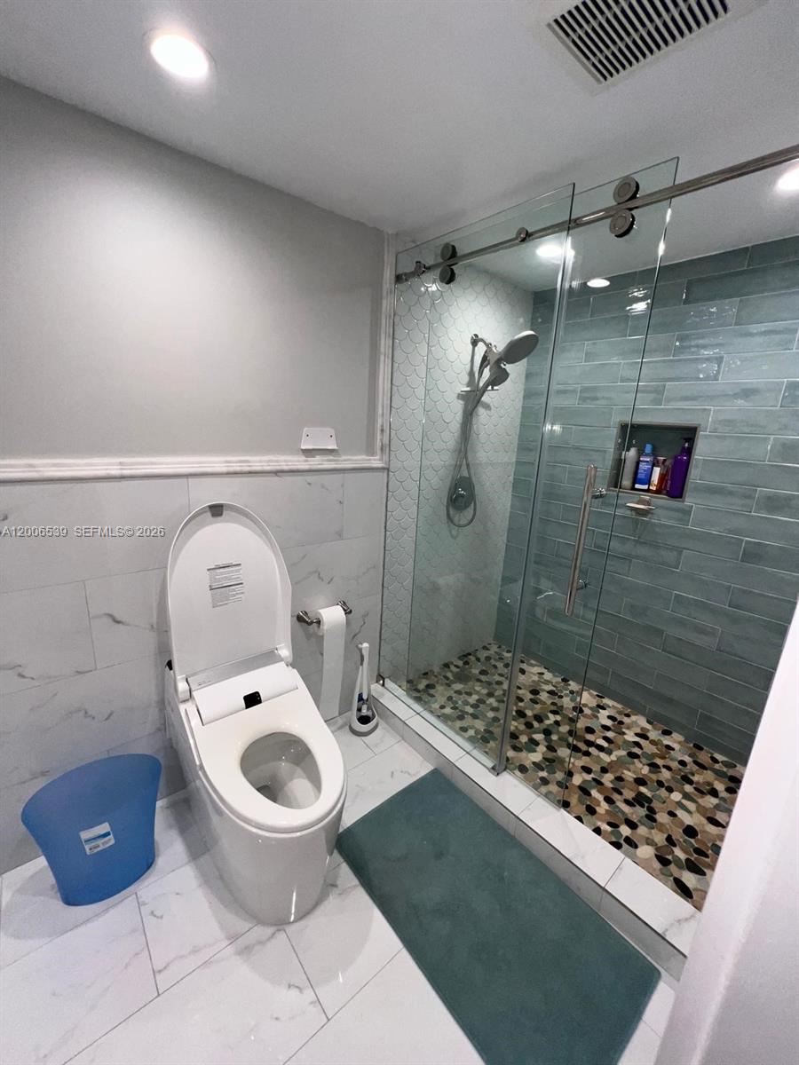 11600 Southwest 83rd Terrace Miami, FL 33173 - Photo 15 of 21 a bathroom with a toilet and a shower