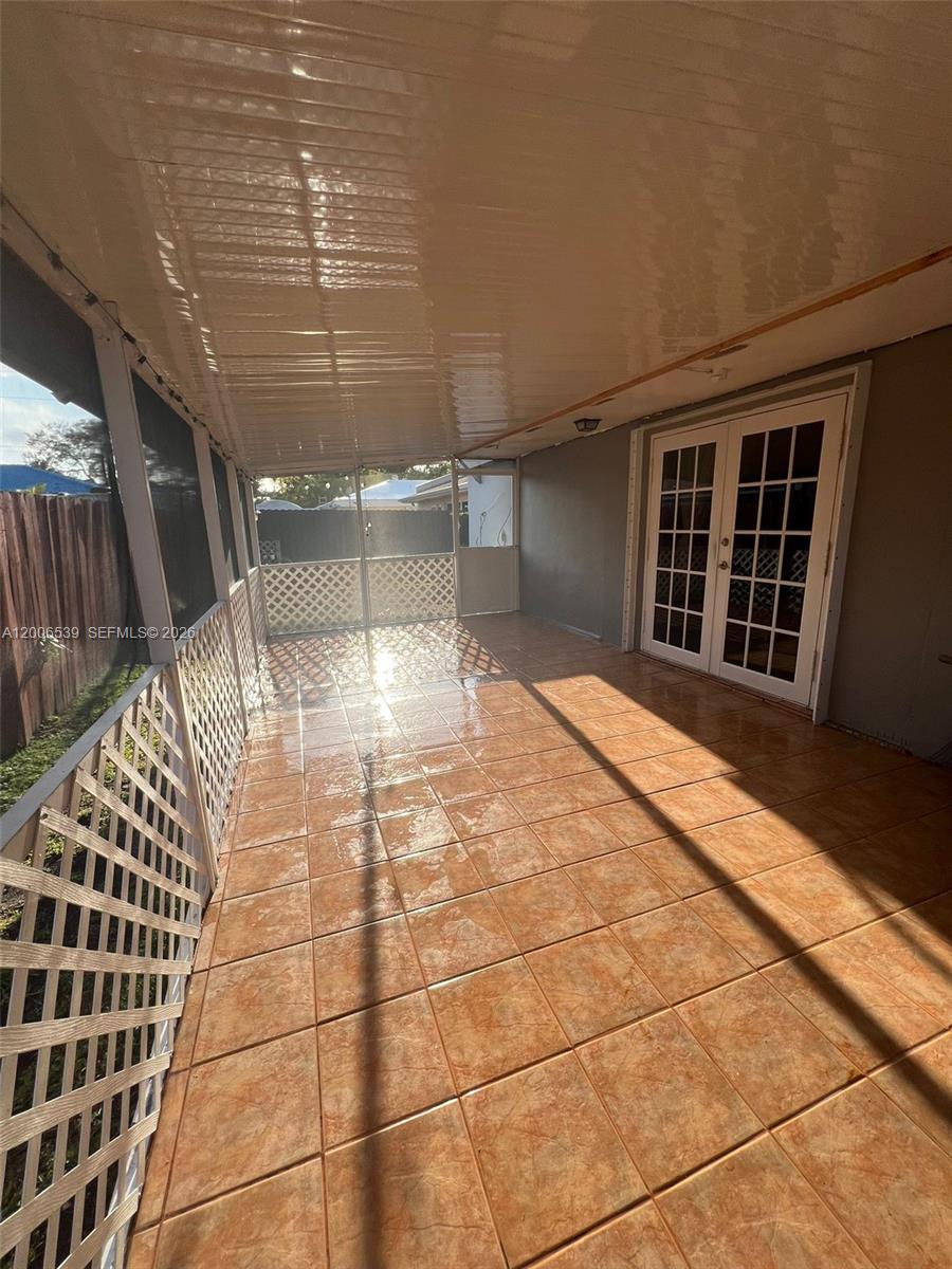 11600 Southwest 83rd Terrace Miami, FL 33173 - Photo 21 of 21 a view of a porch with wooden floor