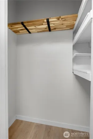 a view of a room with racks on the wall