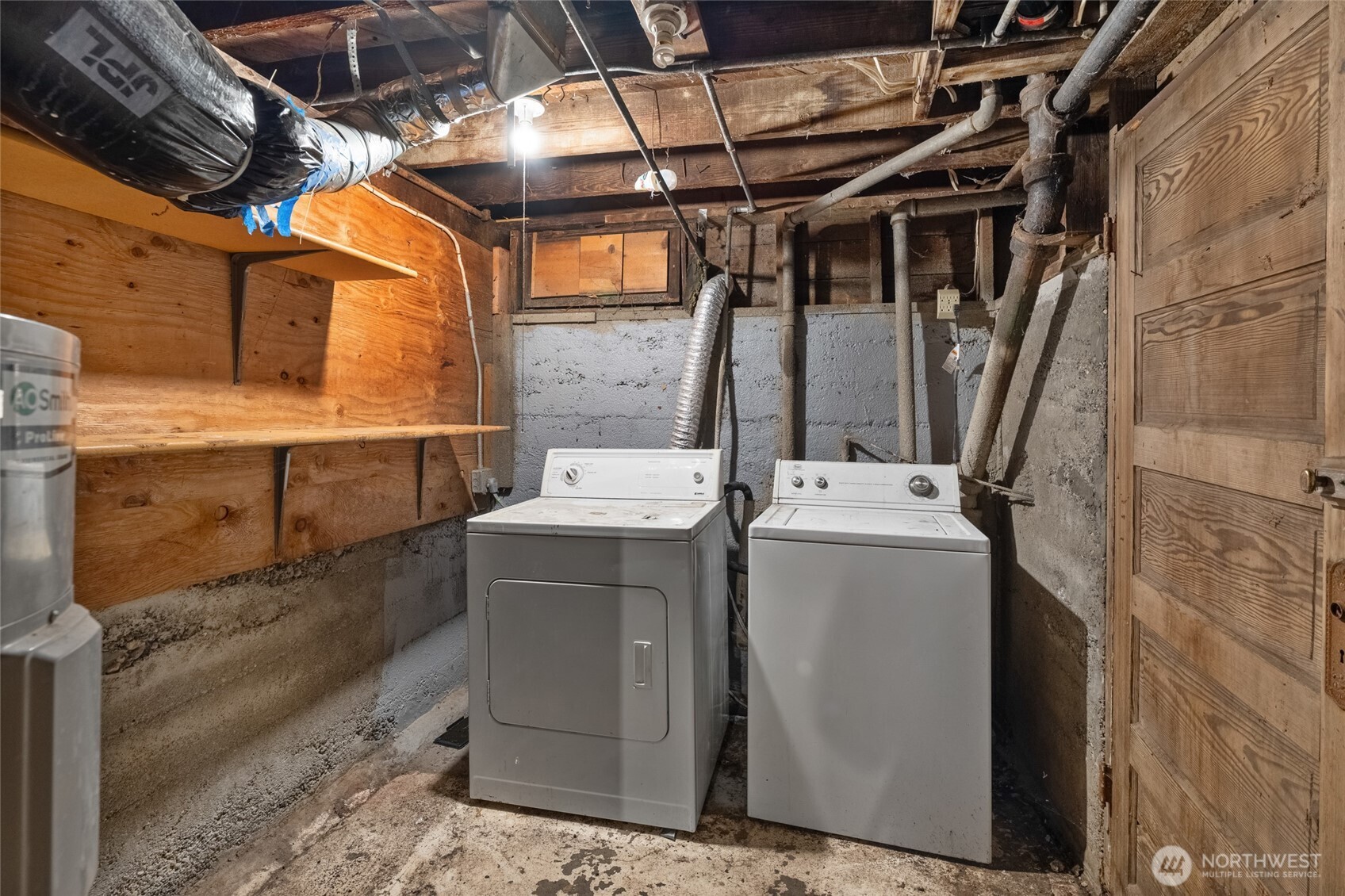 4338 Southwest Willow Street Seattle, WA 98136 - Photo 20 of 30 a utility room with dryer and washer