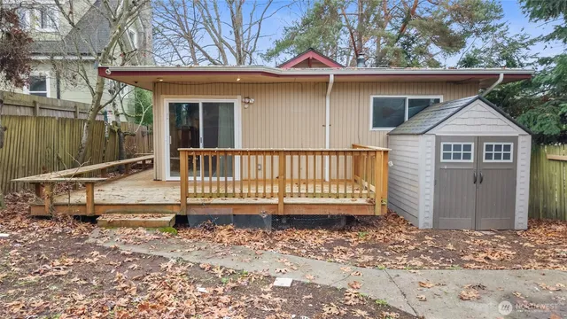 a view of a balcony with wooden floor