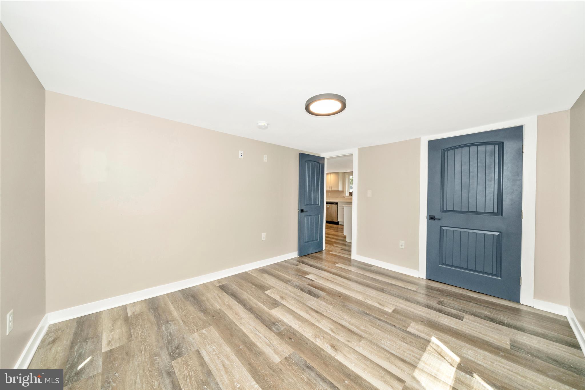 20724 Netz Road Boonsboro, MD 21713 - Photo 19 of 40 a view of a livingroom with wooden floor and closet