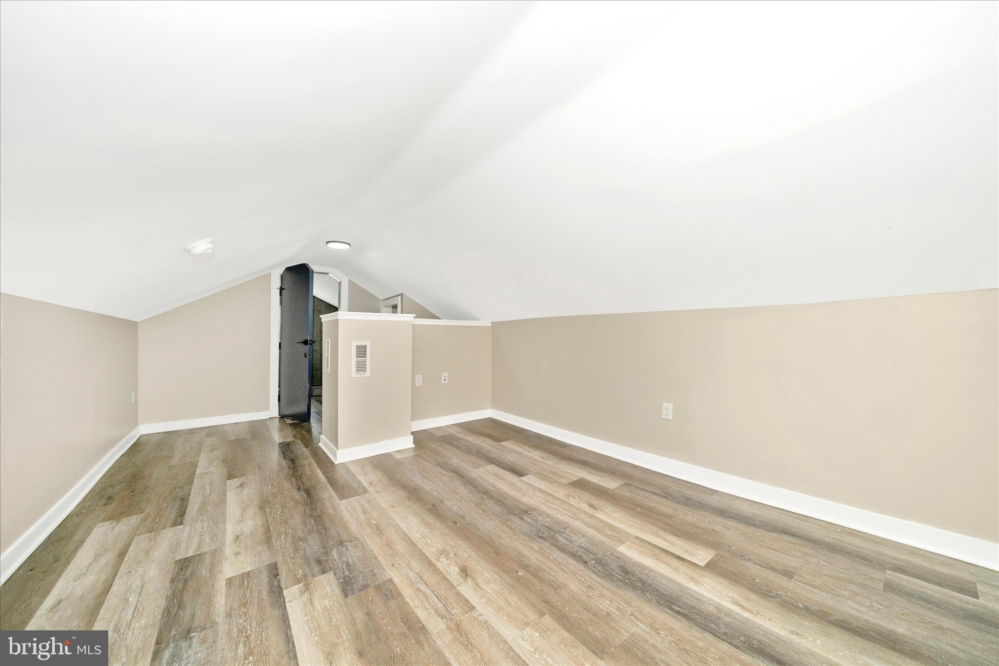 20724 Netz Road Boonsboro, MD 21713 - Photo 21 of 40 a view of empty room with wooden floor