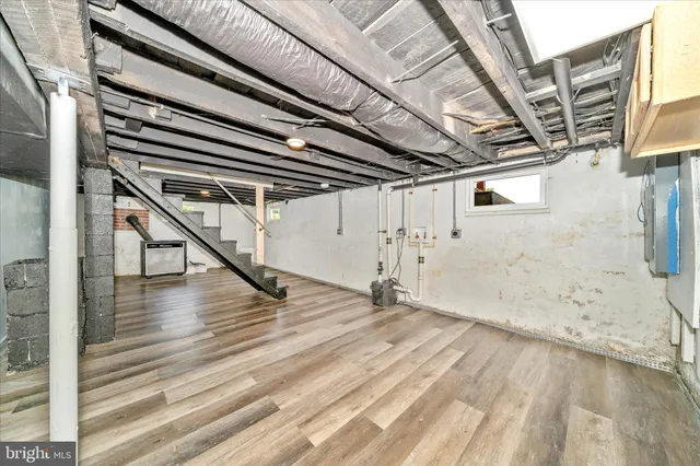 a view of a room with wooden walls