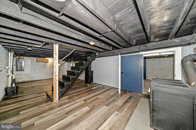 a view of balcony with wooden floor and fence