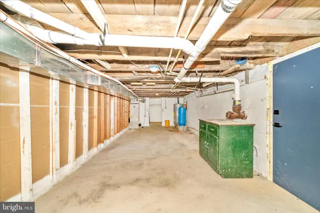 a view of a swimming pool with an outdoor space and seating area