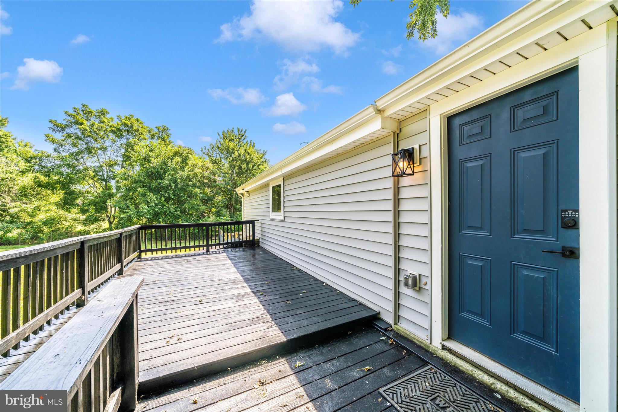 20724 Netz Road Boonsboro, MD 21713 - Photo 33 of 40 a view of deck with wooden floor and fence with a bench