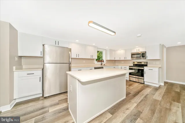 a view of livingroom with furniture and window
