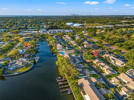 an aerial view of residential houses with outdoor space