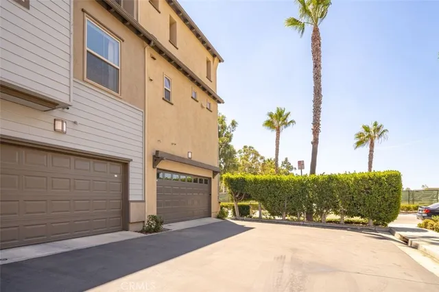 a view of a house with a street