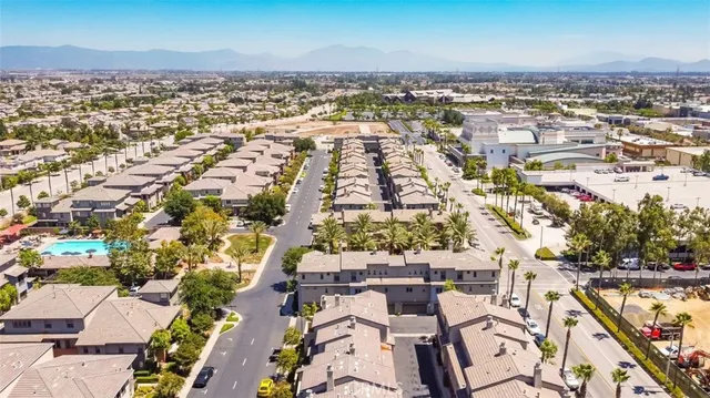 an aerial view of a city with lots of residential buildings