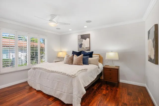 a bedroom with bed and window