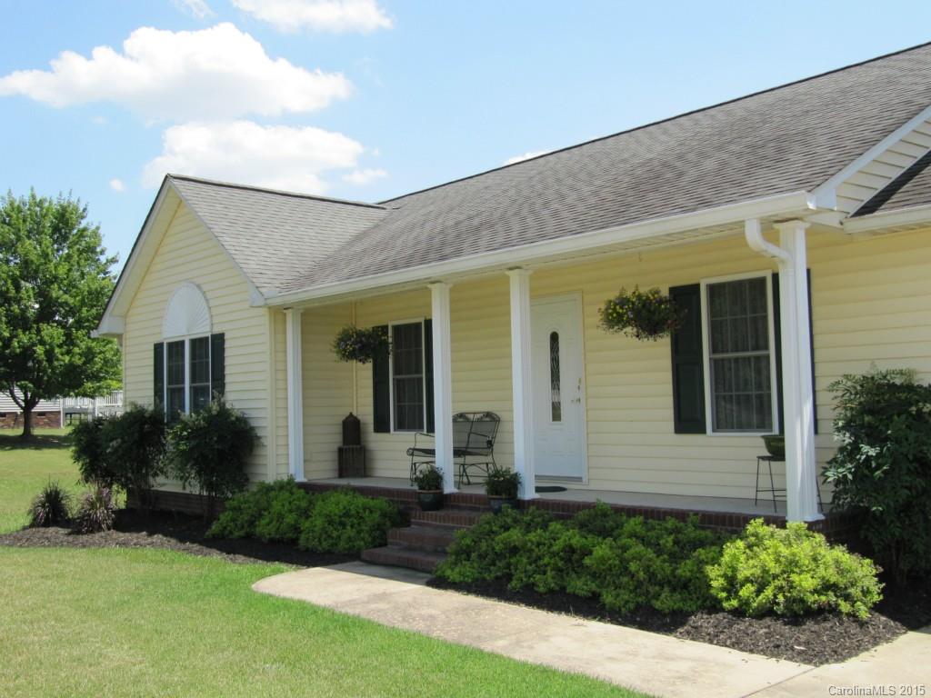 417 St Lukes Church Road Kings Mountain, NC 28086 - Photo 2 of 19 a front view of a house with garden