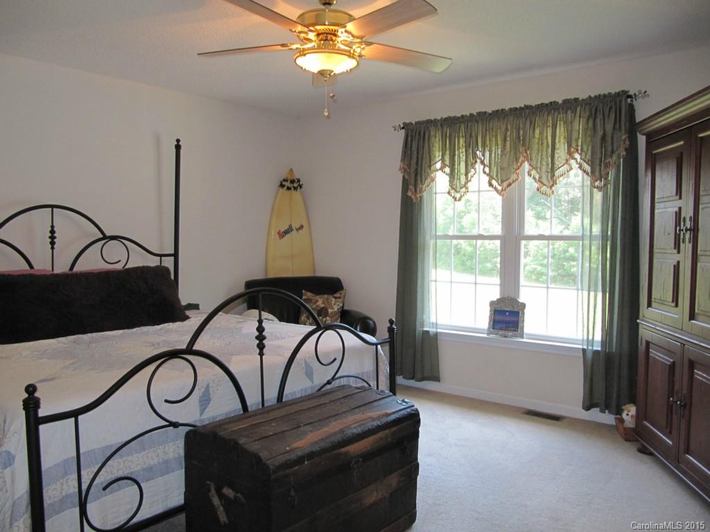 417 St Lukes Church Road Kings Mountain, NC 28086 - Photo 12 of 19 a view of a livingroom with furniture ceiling fan