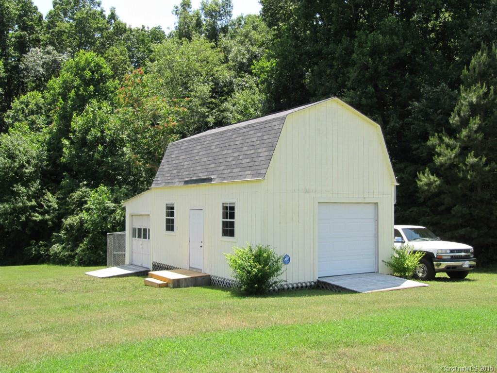 417 St Lukes Church Road Kings Mountain, NC 28086 - Photo 17 of 19 a view of a house with backyard and trees