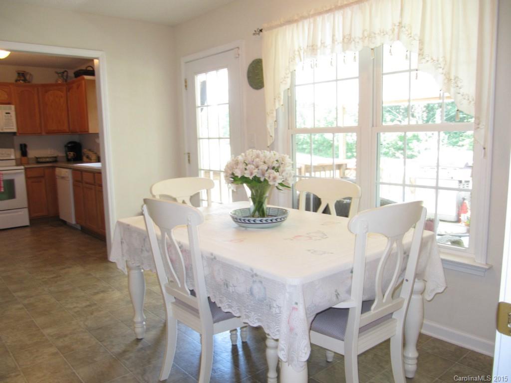 417 St Lukes Church Road Kings Mountain, NC 28086 - Photo 9 of 19 a view of a dining room with furniture window and outside view