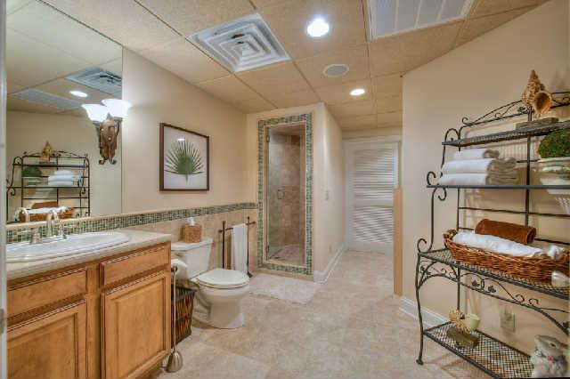 914 Overton Lea Road Nashville, TN 37220 - Photo 14 of 20 a bathroom with a sink a toilet and shower