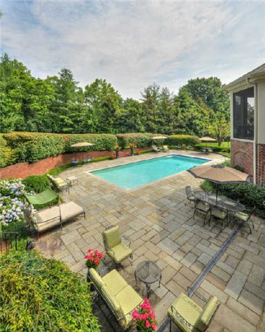 914 Overton Lea Road Nashville, TN 37220 - Photo 16 of 20 a view of yard with swimming pool and green space