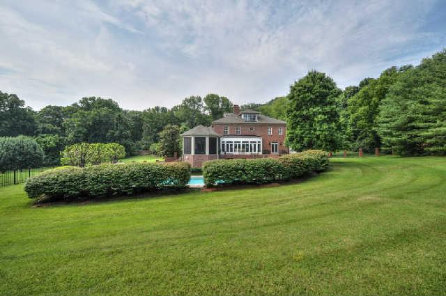 914 Overton Lea Road Nashville, TN 37220 - Photo 18 of 20 a view of a house with a big yard plants and large trees