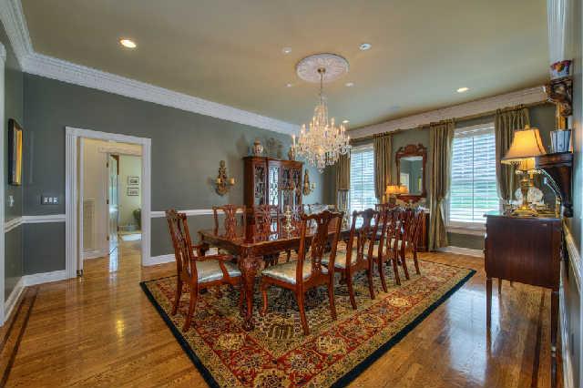 914 Overton Lea Road Nashville, TN 37220 - Photo 5 of 20 a view of a dining room with furniture and chandelier