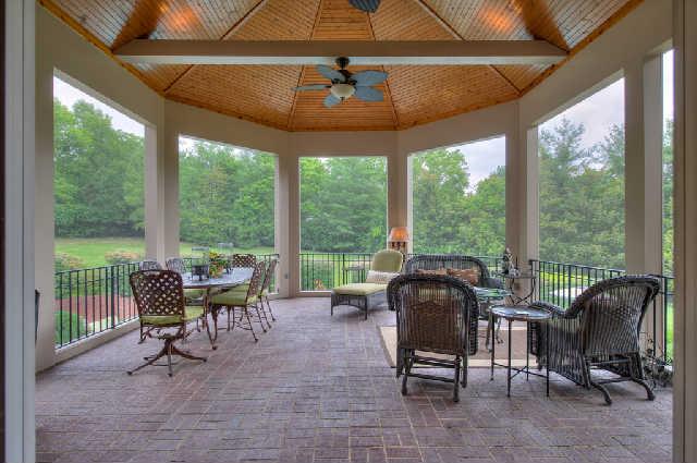 914 Overton Lea Road Nashville, TN 37220 - Photo 8 of 20 a living room with furniture and a floor to ceiling window