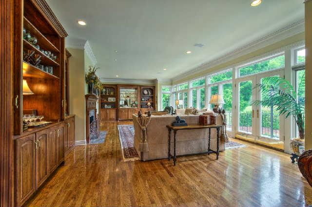 914 Overton Lea Road Nashville, TN 37220 - Photo 9 of 20 a living room with furniture and large windows
