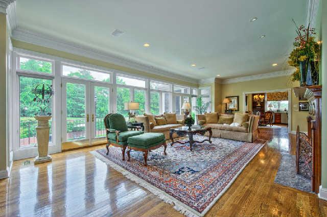 914 Overton Lea Road Nashville, TN 37220 - Photo 10 of 20 a living room with fireplace furniture and a large window