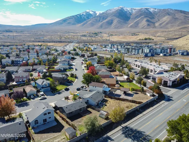 an aerial view of a building with outdoor space