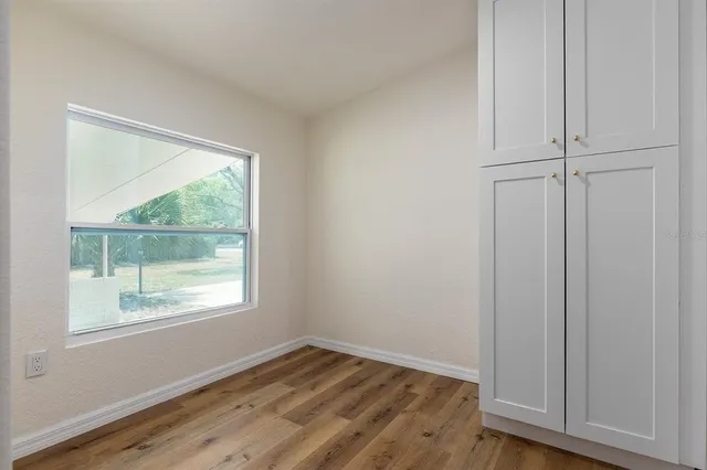 a bathroom with a double vanity sink and mirror