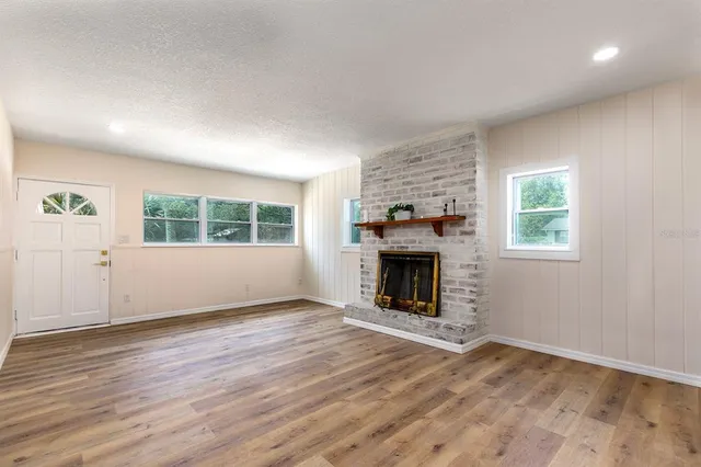 a kitchen with stainless steel appliances a refrigerator sink and stove