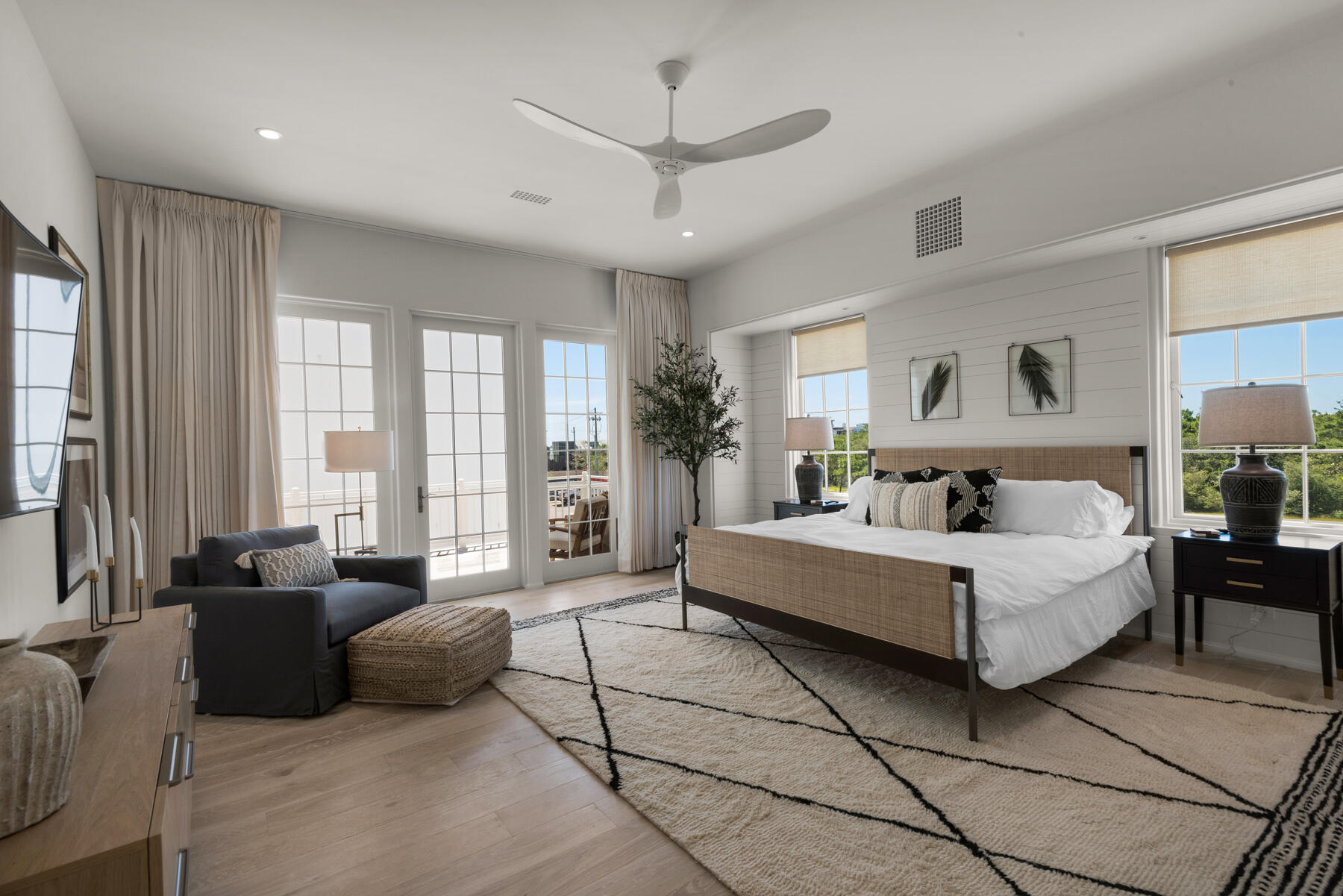 25 Stella Way Inlet Beach, Unit M 7 Inlet Beach, FL 32461 - Photo 17 of 48 a living room with furniture large windows and a chandelier