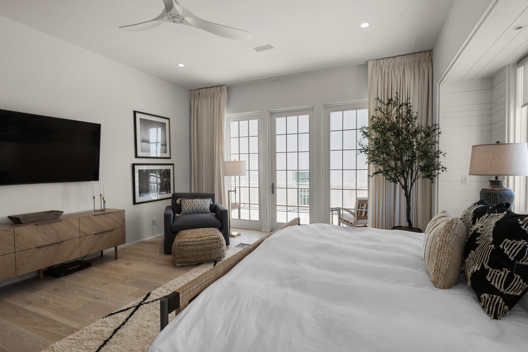 25 Stella Way Inlet Beach, Unit M 7 Inlet Beach, FL 32461 - Photo 19 of 48 a bedroom with a bed television and a large window