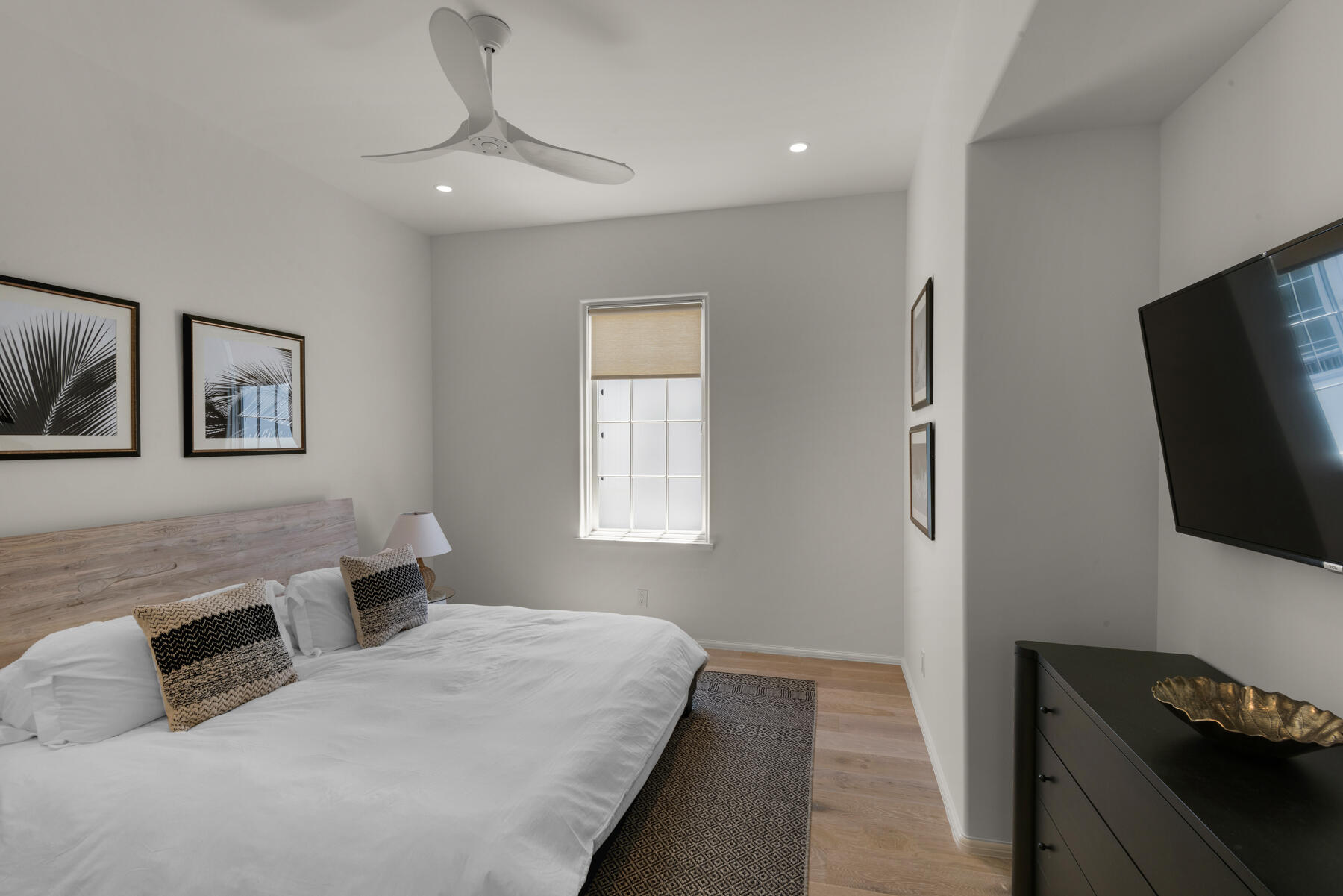 25 Stella Way Inlet Beach, Unit M 7 Inlet Beach, FL 32461 - Photo 25 of 48 a bedroom with a bed and a flat screen tv