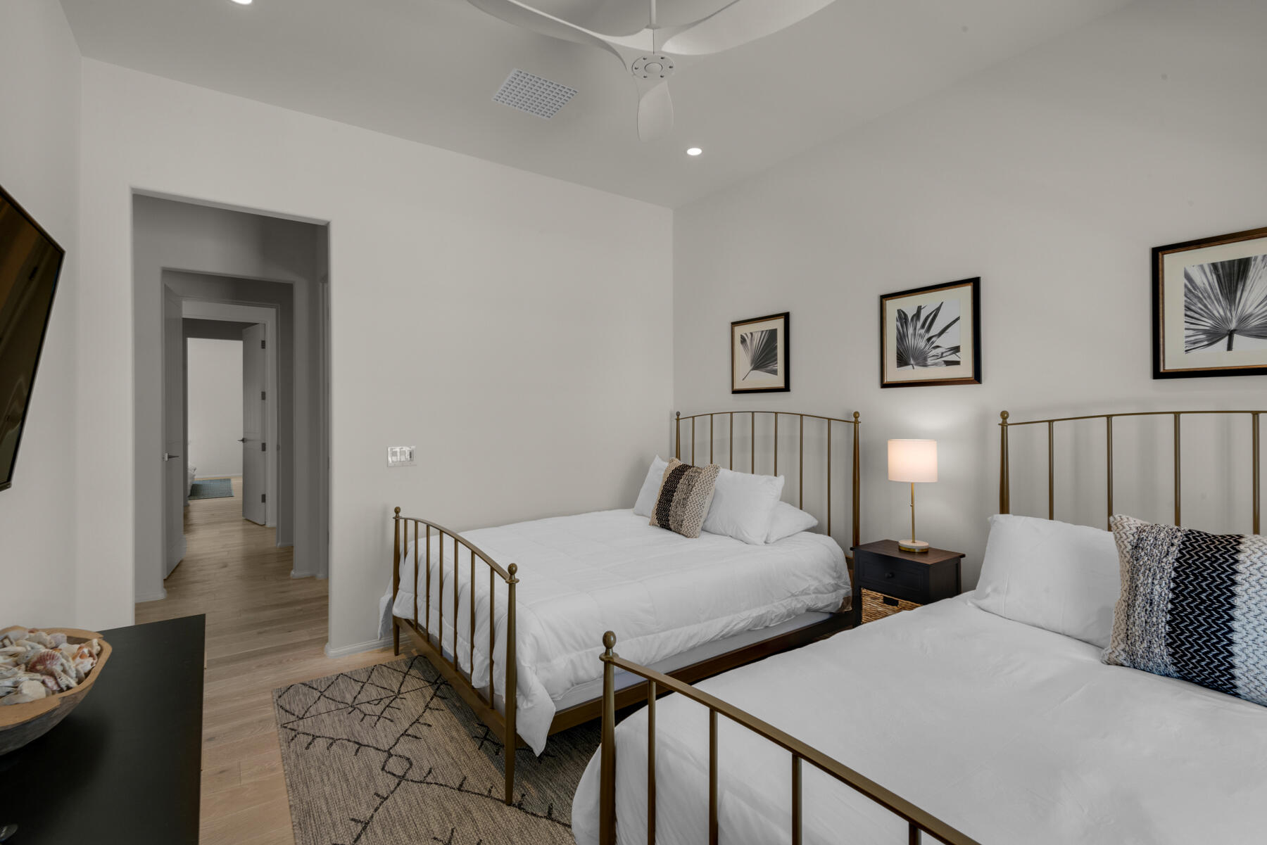 25 Stella Way Inlet Beach, Unit M 7 Inlet Beach, FL 32461 - Photo 30 of 48 a bedroom with two beds and a table