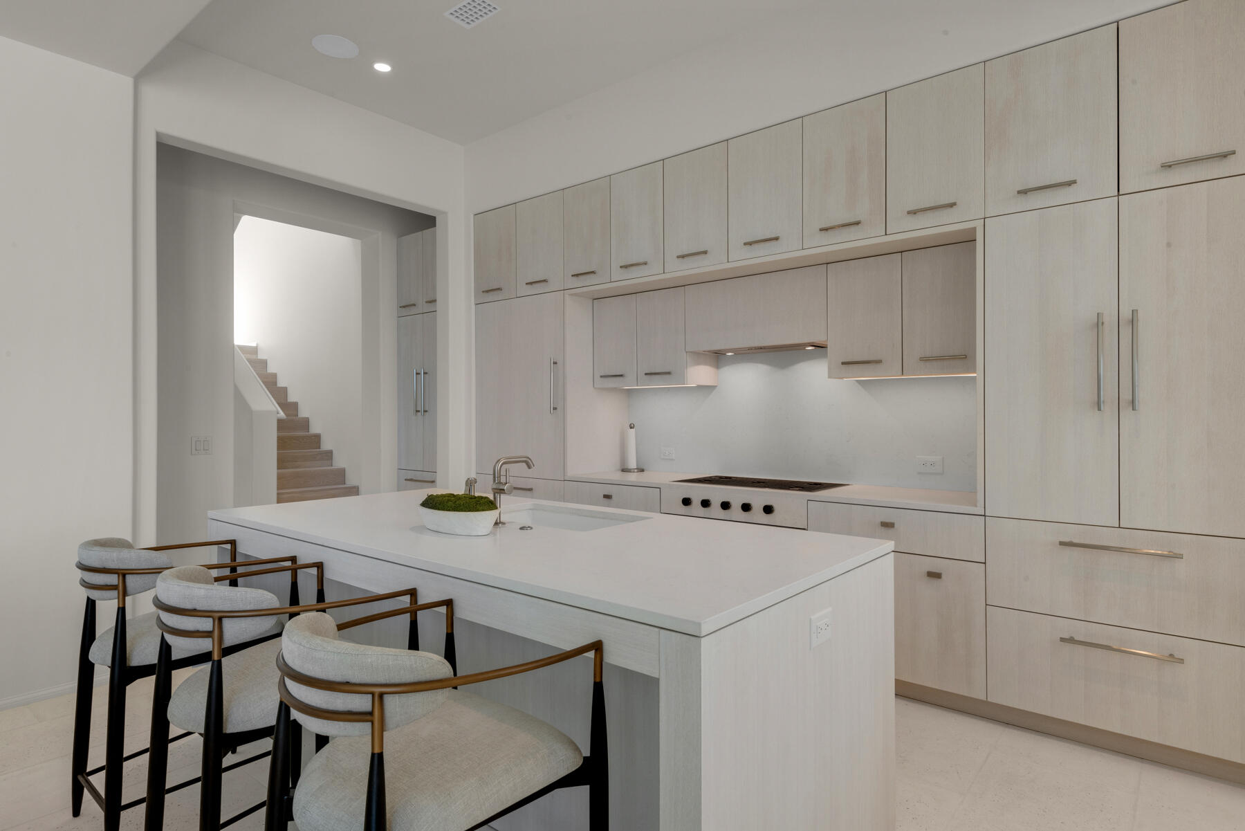 25 Stella Way Inlet Beach, Unit M 7 Inlet Beach, FL 32461 - Photo 3 of 48 a kitchen with stainless steel appliances granite countertop a stove a white table and chairs