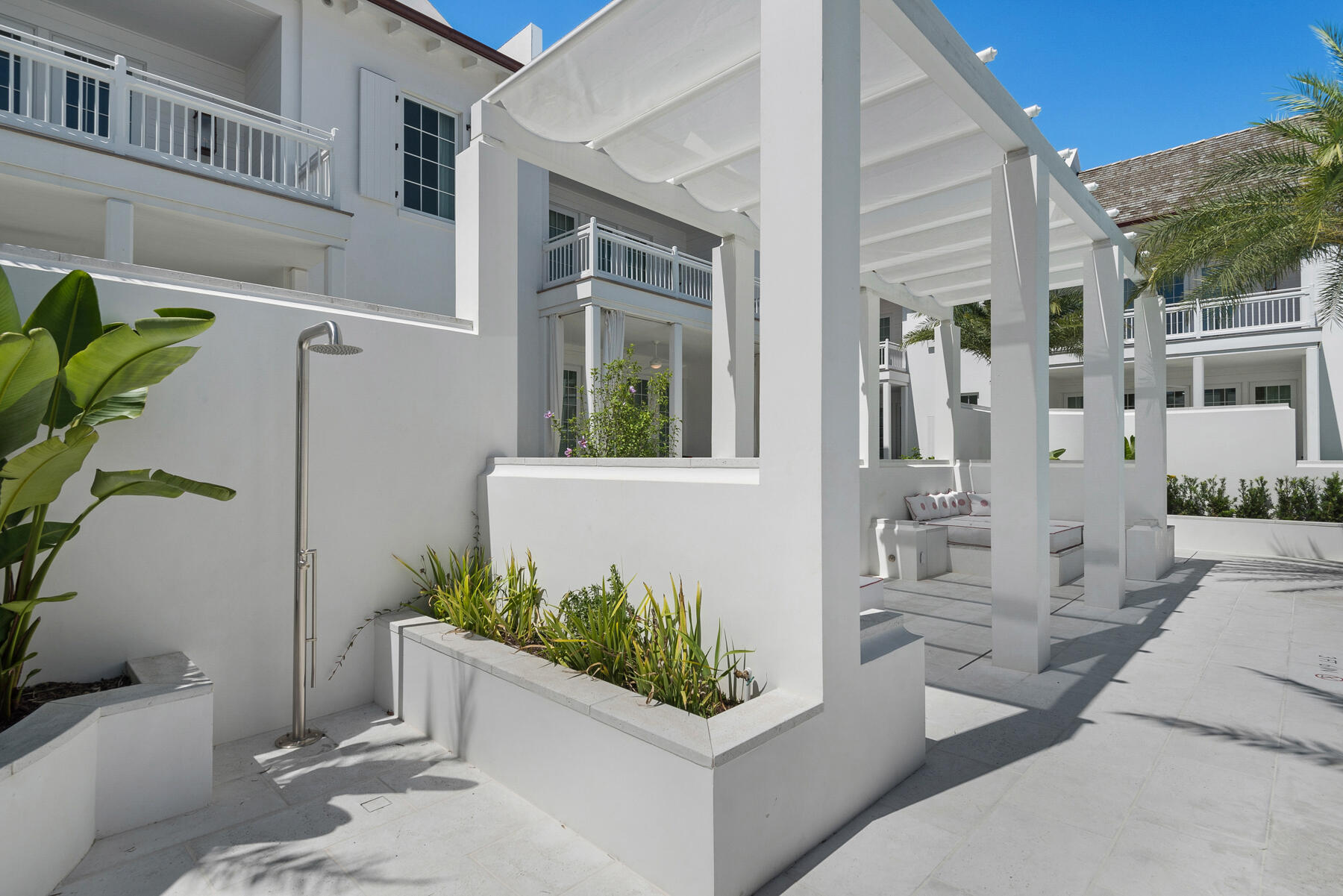 25 Stella Way Inlet Beach, Unit M 7 Inlet Beach, FL 32461 - Photo 44 of 48 a view of an entryway with outdoor seating