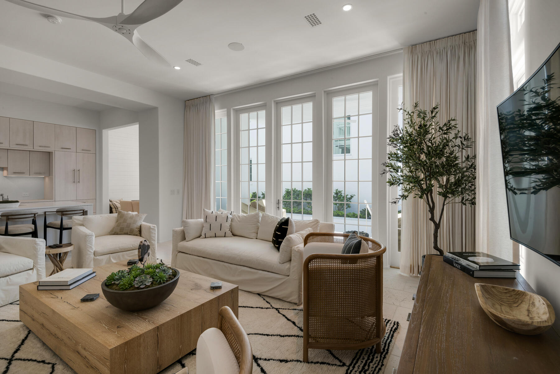 25 Stella Way Inlet Beach, Unit M 7 Inlet Beach, FL 32461 - Photo 9 of 48 a living room with furniture potted plant and a large window