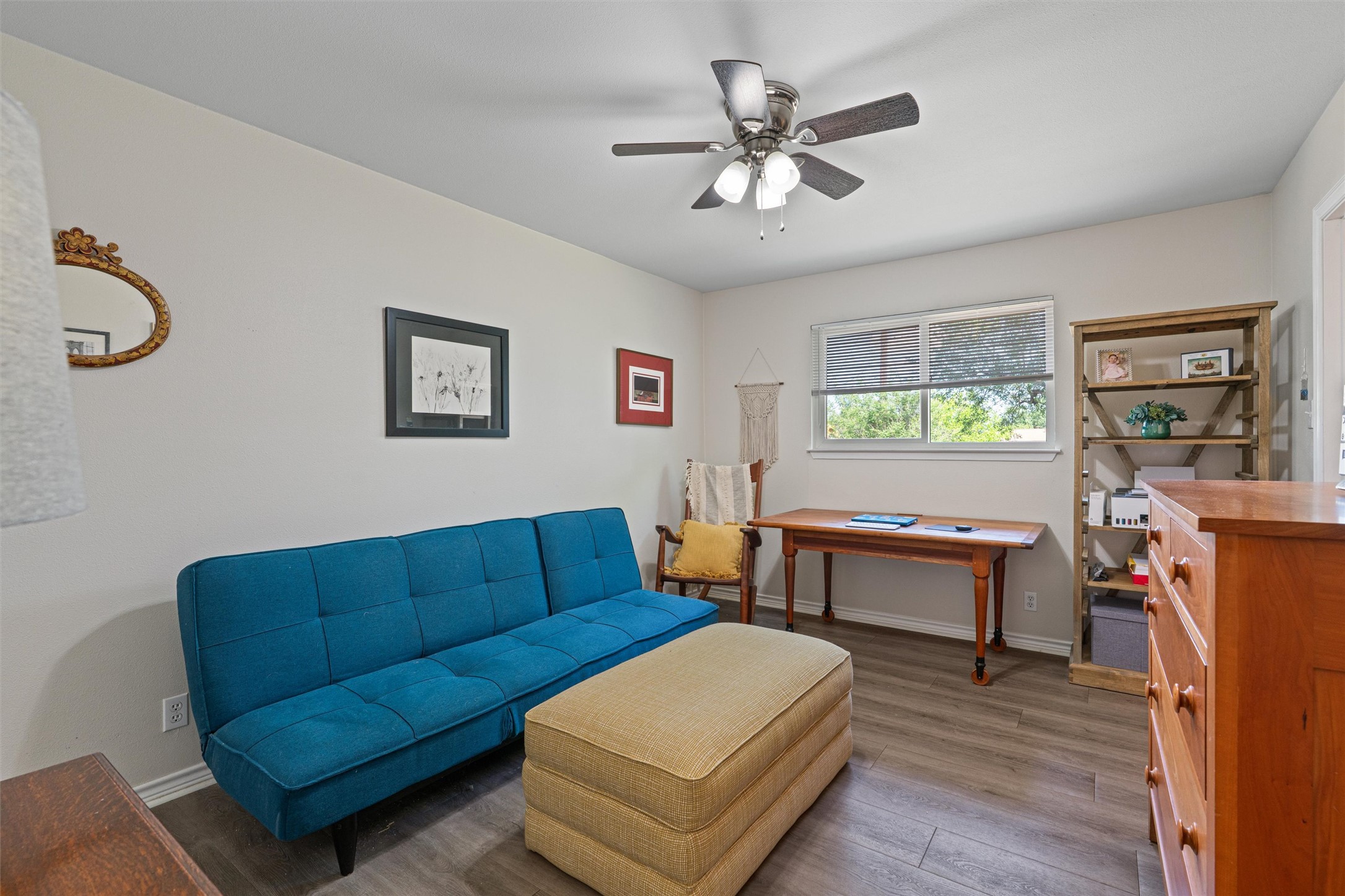 400 East Logan Street Round Rock, TX 78664 - Photo 11 of 25 a living room with furniture and a flat screen tv