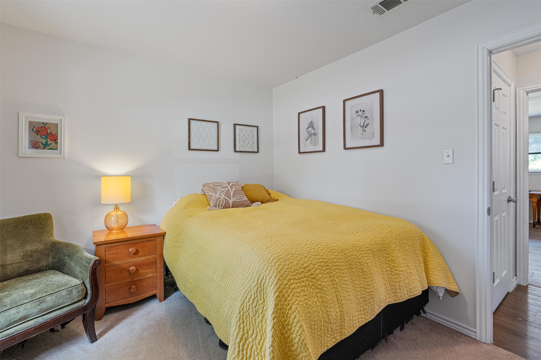 400 East Logan Street Round Rock, TX 78664 - Photo 15 of 25 a bedroom with a bed and couch