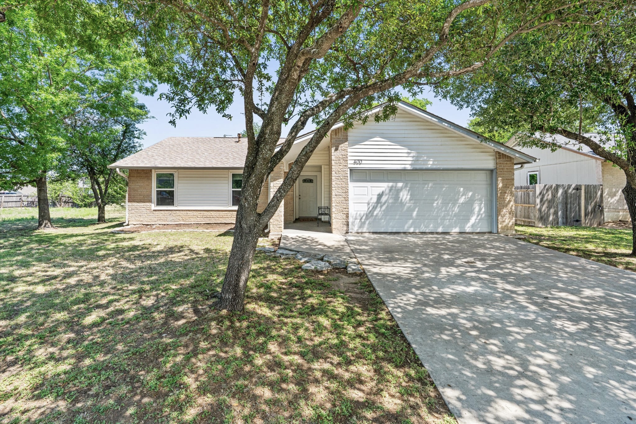 400 East Logan Street Round Rock, TX 78664 - Photo 2 of 25 a front view of house with yard