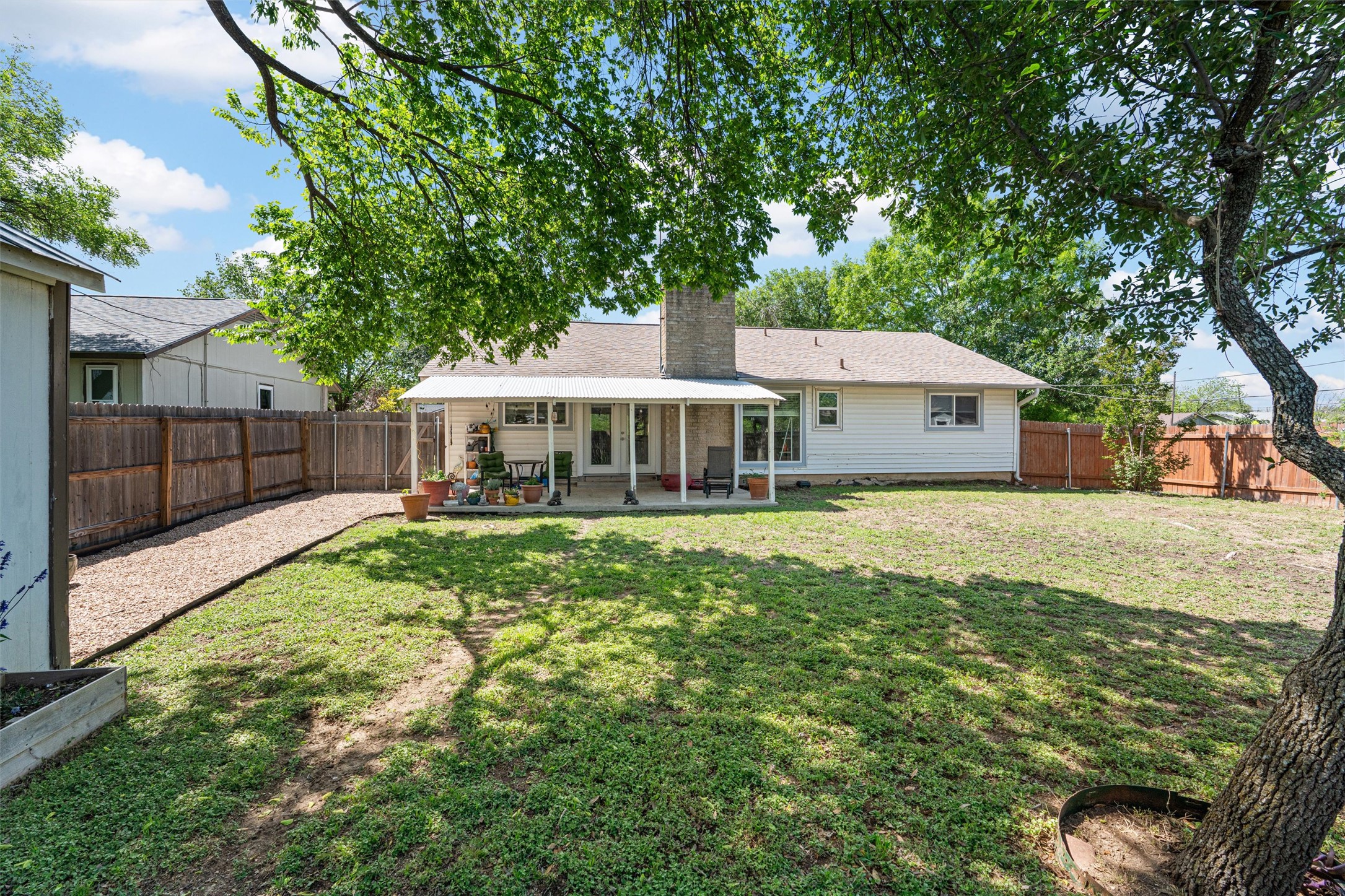 400 East Logan Street Round Rock, TX 78664 - Photo 24 of 25 a front view of a house with a yard