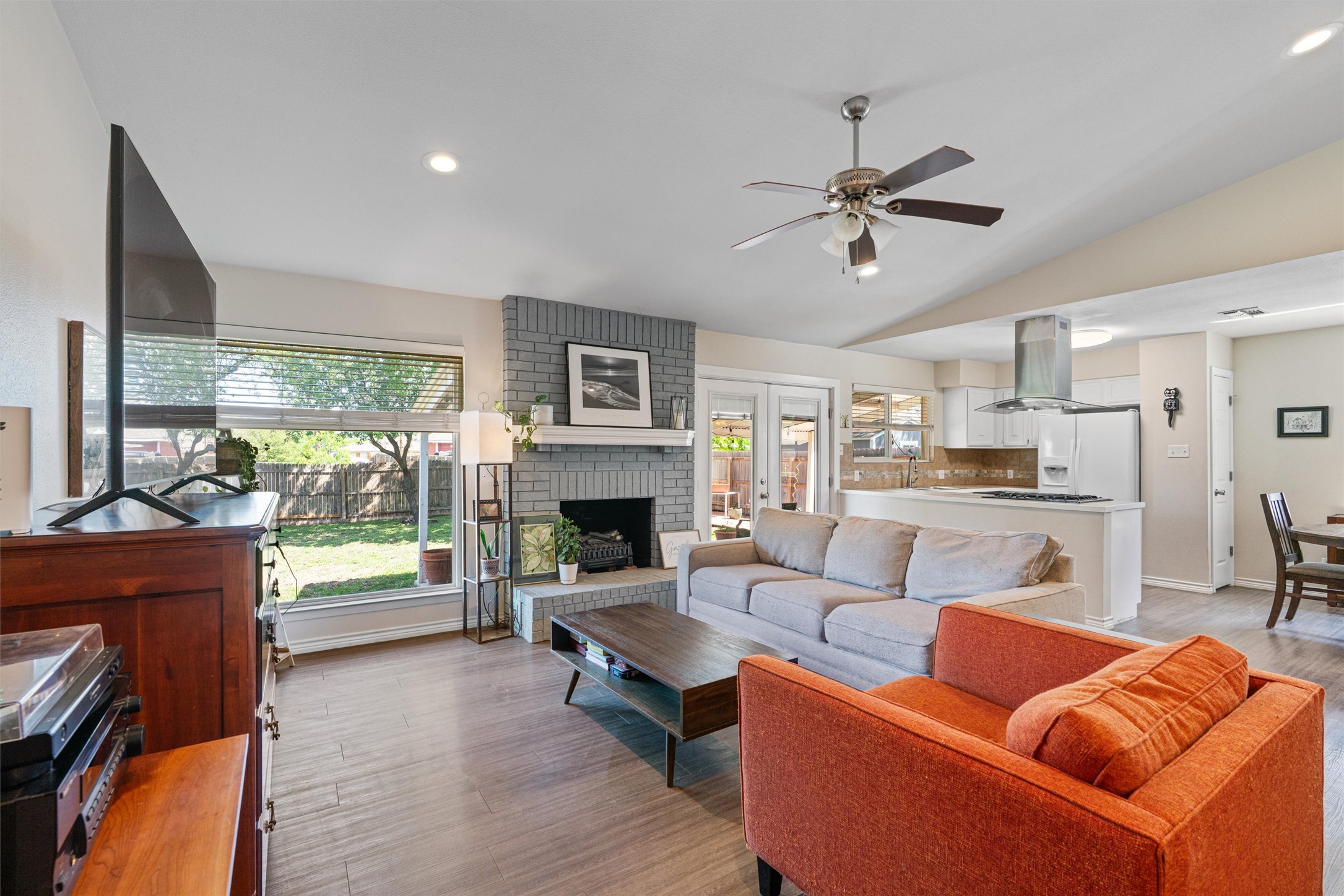 400 East Logan Street Round Rock, TX 78664 - Photo 6 of 25 a living room with furniture fireplace and a large window