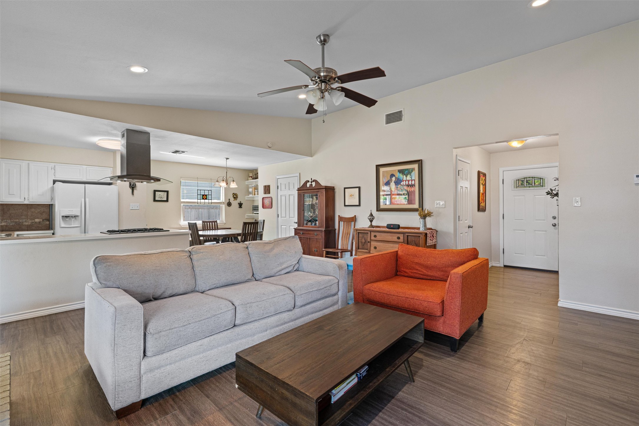 400 East Logan Street Round Rock, TX 78664 - Photo 7 of 25 a living room with furniture and wooden floor