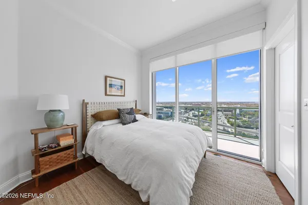 a utility room with cabinets washer and dryer