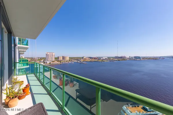 a view of a balcony with an outdoor space