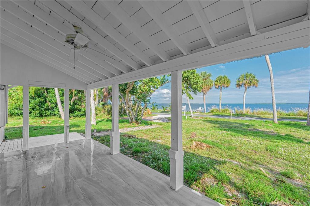 7007 South Indian River Drive Fort Pierce, FL 34982 - Photo 6 of 23 a view of a room with a big yard