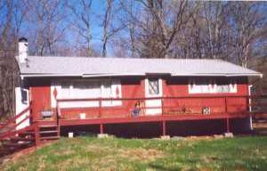 9 Stamford Road Dingmans Ferry, PA 18328 - Photo 1 of 1 a backyard of a house