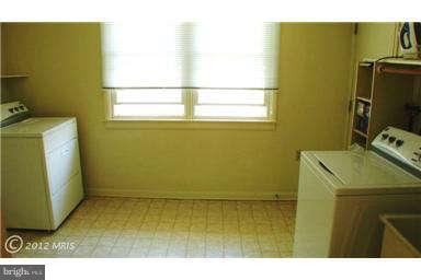112 Gloucester Road Queenstown, MD 21658 - Photo 12 of 24 a view of storage and utility room with a window